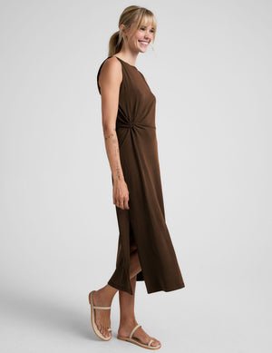 brown midi dress with a bateau neck and side twist.