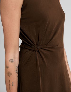brown midi dress with a bateau neck and side twist.