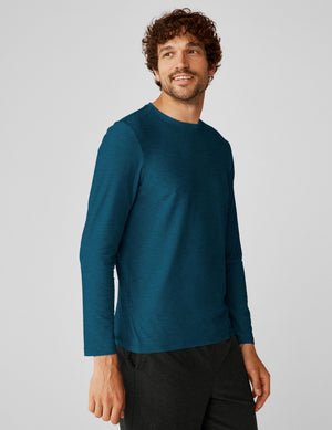blue men's long sleeve crew neck top.