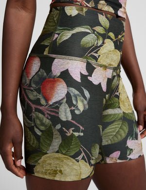 green garden printed high-waisted biker shorts.