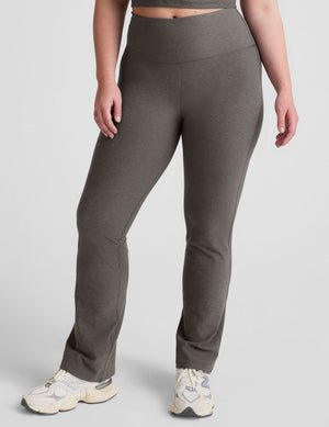 grey high-waisted bootcut pants.