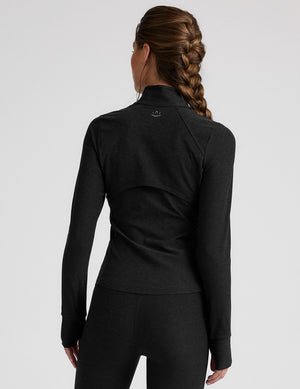 black zip-up mock neck jacket with pockets and thumbholes.