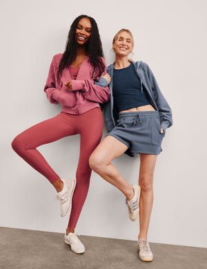 red high-waisted midi length leggings.