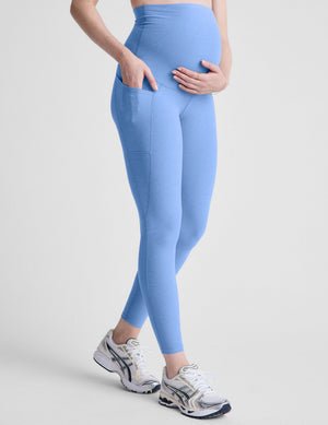 blue maternity midi length leggings with pockets.