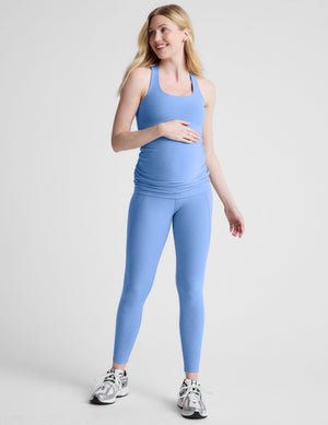 blue maternity midi length leggings with pockets.