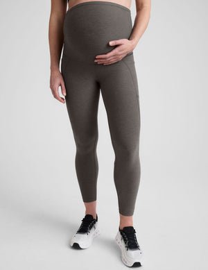 grey midi length maternity leggings with side pockets.